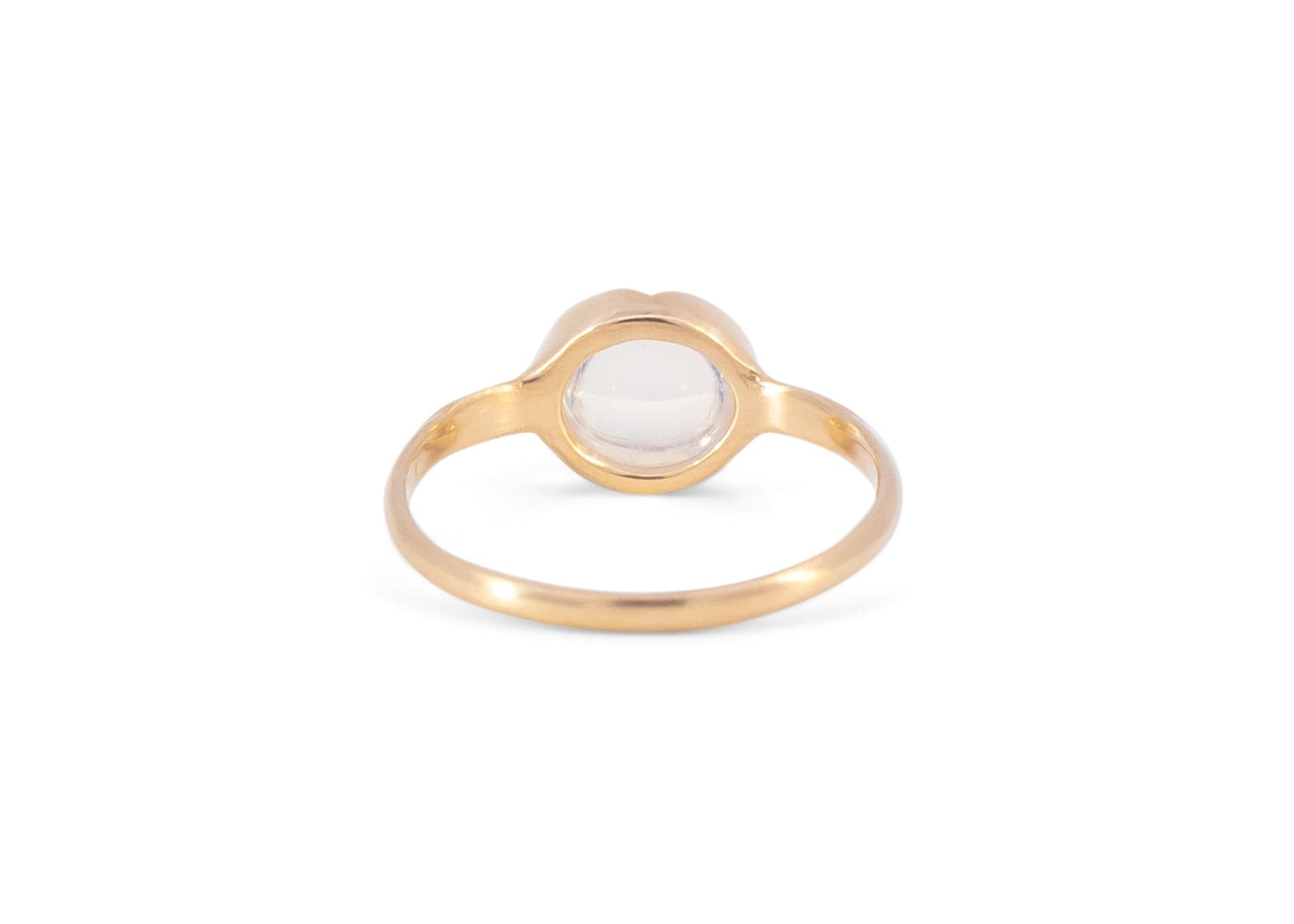 back of 14k gold blue moonstone ring with carved arrow details