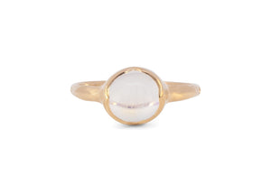 front of 14k gold blue moonstone ring with carved arrow details