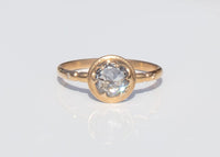 antique inspired alternative engagement ring with claw set rose cut salt and pepper diamond