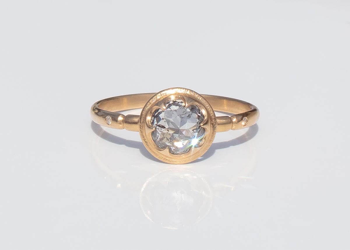 antique inspired alternative engagement ring with claw set rose cut salt and pepper diamond