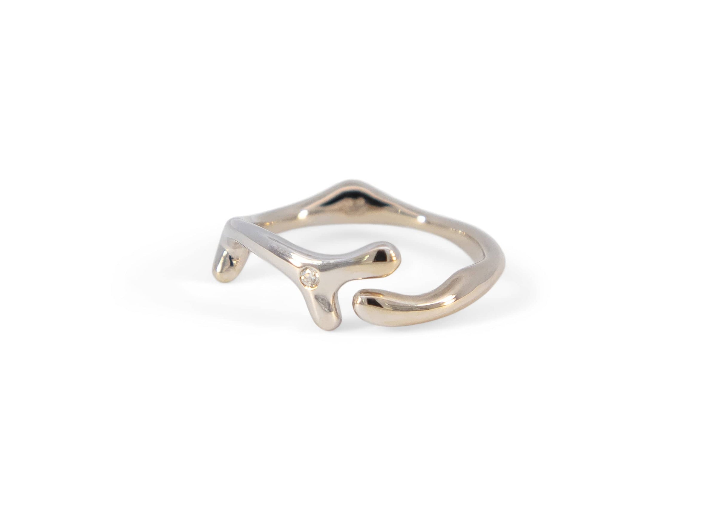 white gold seaweed ring with diamond