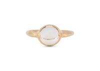 front of 14k gold blue moonstone ring with carved arrow details