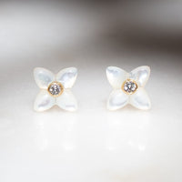 small gold mother of pearl flower earrings with white diamonds