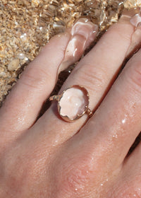 14k gold clear quartz crystal ring on hand in water