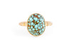 solid 14k gold turquoise ring with carved details on band