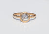 gold alternative engagement ring with claw set rose cut salt and pepper diamond