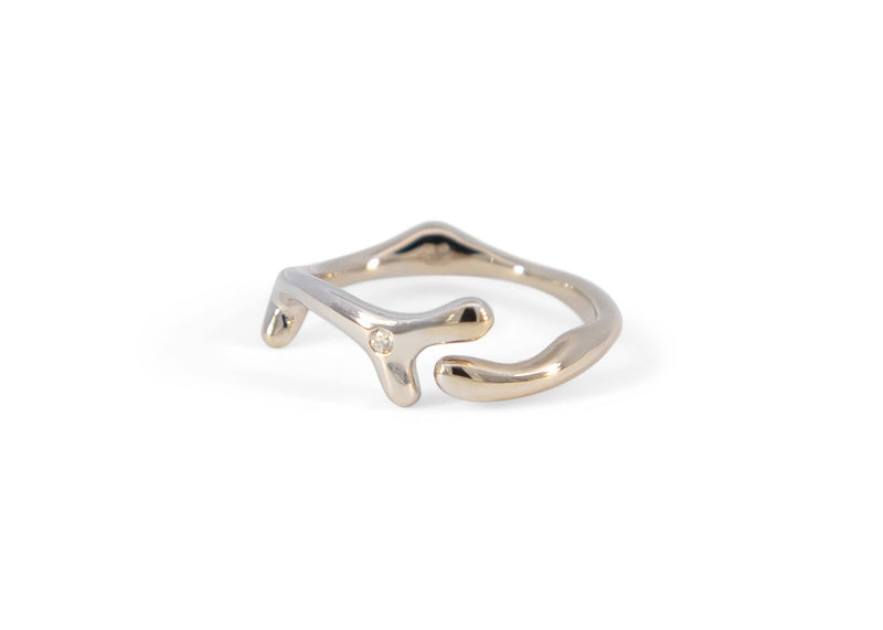 white gold seaweed ring with diamond