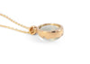 back of 14k gold green moonstone necklace with scalloped bezel