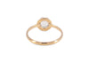 back of gold blue moonstone ring in scalloped setting