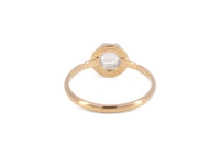 back of gold blue moonstone ring in scalloped setting
