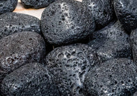 ocean tumbled and polished black hawaiian lava rock