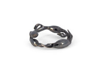 side view of oxidized silver rockweed seaweed ring