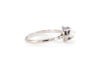 side of silver antique inspired ring with bullet shaped blue moonstone in scalloped setting