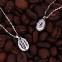 sterling silver coffee bean necklace with white topaz stones