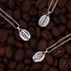 sterling silver coffee bean necklace with white topaz stones on coffee beans