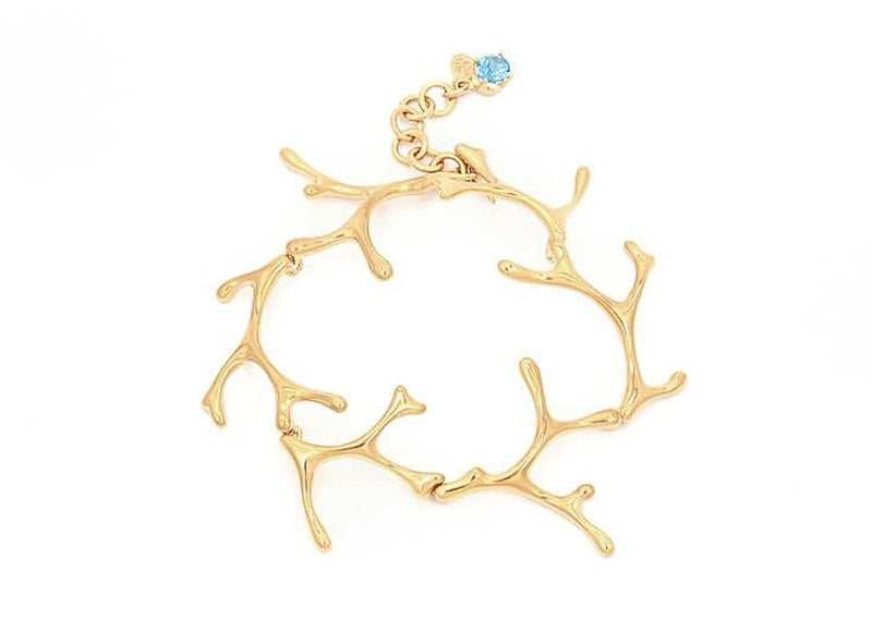 gold seaweed link bracelet with blue gemstone