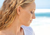 solid gold minnow wire threader earrings on model