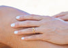 gold seaweed ring on hand