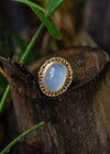 fan coral inspired 14k gold chalcedony cocktail ring on bamboo stump