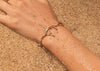 14k gold limu seaweed bracelet on model