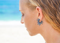 hawaii sea urchin earrings on model