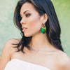 scarab beetle wing chandelier style earrings on model