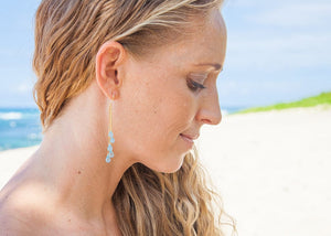 gemstone cascade earrings on model