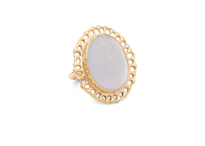 14k gold cocktail ring with cutout sea fan motif around blue chalcedony stone in center
