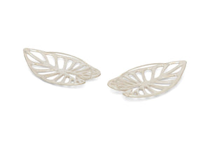 back view of sterling silver taro leaf earrings with cutout designs