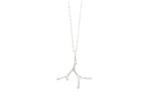 sterling silver seaweed necklace with diamonds on chain with barbell details