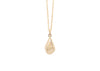 faceted gold teardrop shaped pendant on chain