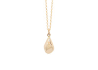 faceted gold teardrop shaped pendant on chain