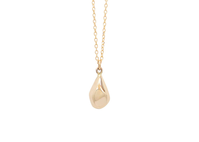 faceted gold teardrop shaped pendant on chain
