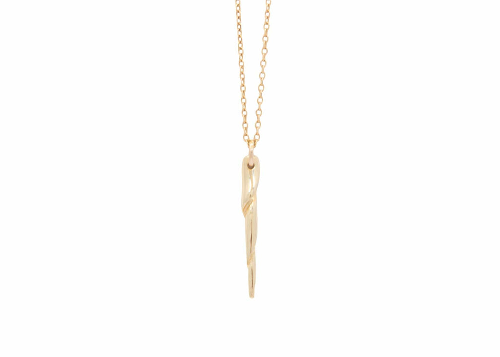 gold chain necklace with twisted shell spine dangle