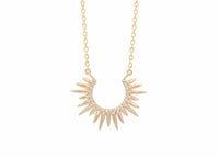 spiky yellow gold urchin necklace with diamonds