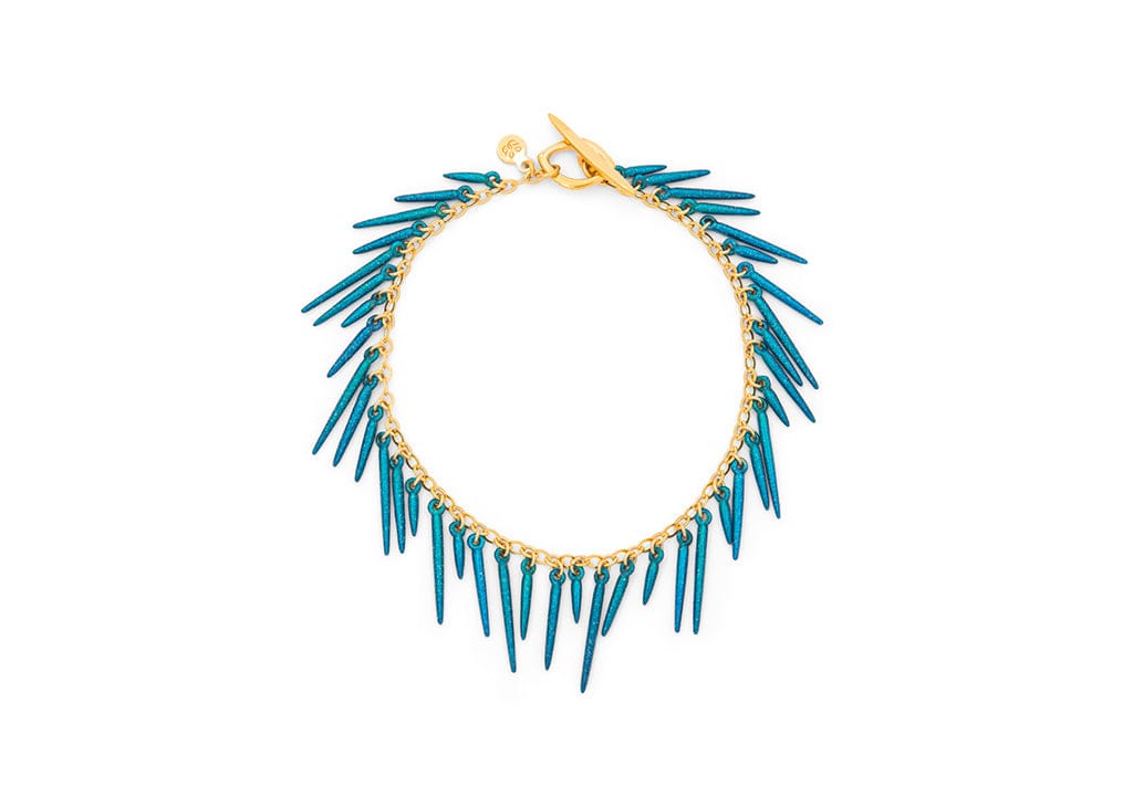 fringe style bracelet with blue powder coated spikes and 14k gold vermeil