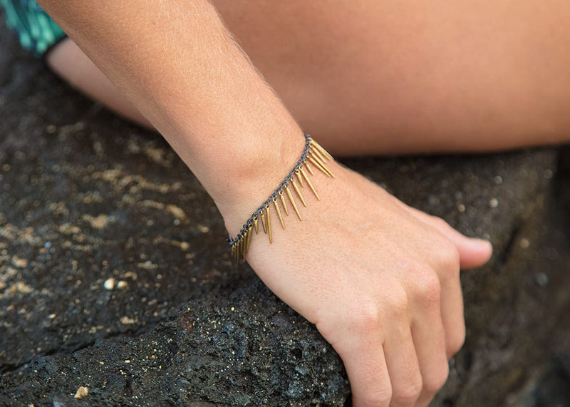 gold powder coated fringe style bracelet with oxidized sterling silver