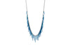 fringe style necklace with blue powder coated spikes and oxidized sterling silver