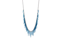 fringe style necklace with blue powder coated spikes and oxidized sterling silver