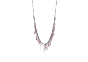 fringe style necklace with rose gold powder coated spikes and oxidized sterling silver
