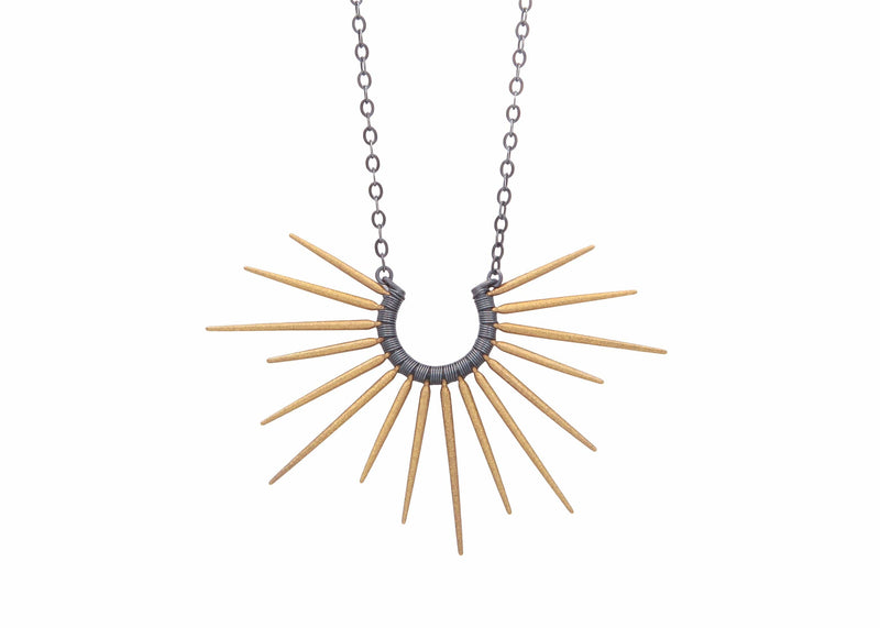 necklace with black chain and gold spikes