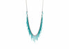 sea urchin inspired fringe necklace with oxidized silver chain and teal blue powder coated spikes