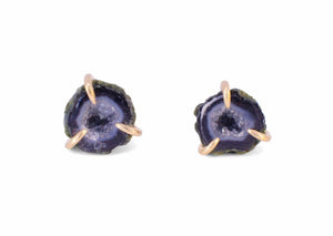 blue and black miniature tabasco geode earrings with gold claw setting