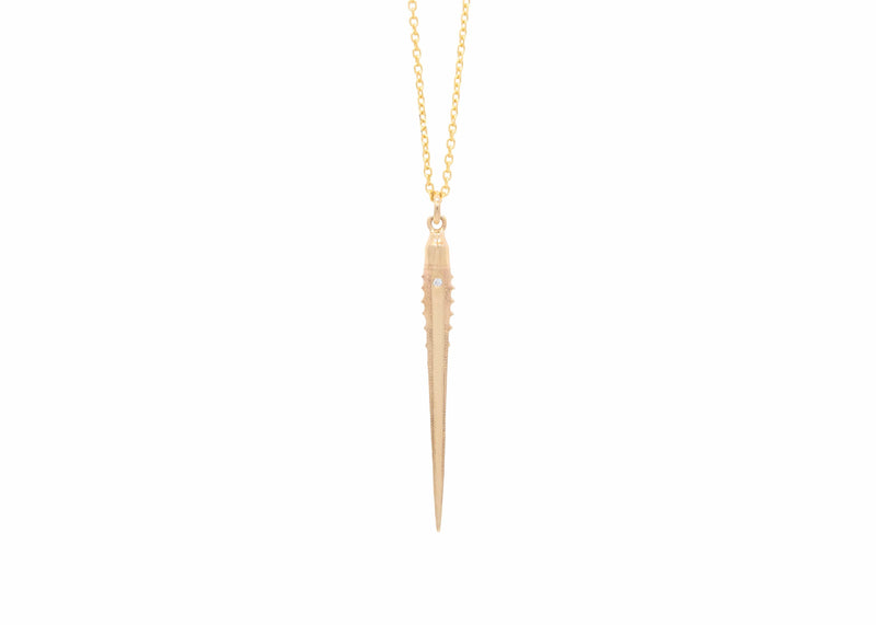 large solid gold urchin spine necklace with single diamond
