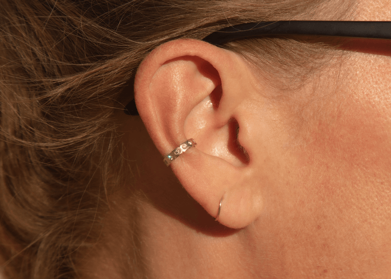 14k gold ear cuff with diamonds and notched details on ear