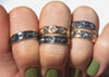 urchin shell inspired rings with inverted gemstones on hand