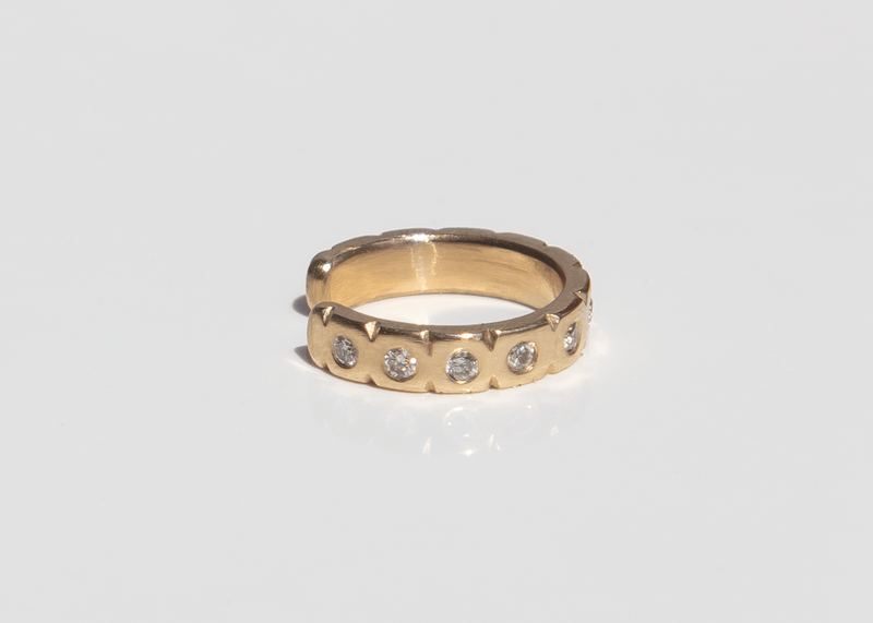 solid 14k gold ear cuff with diamonds and notched details