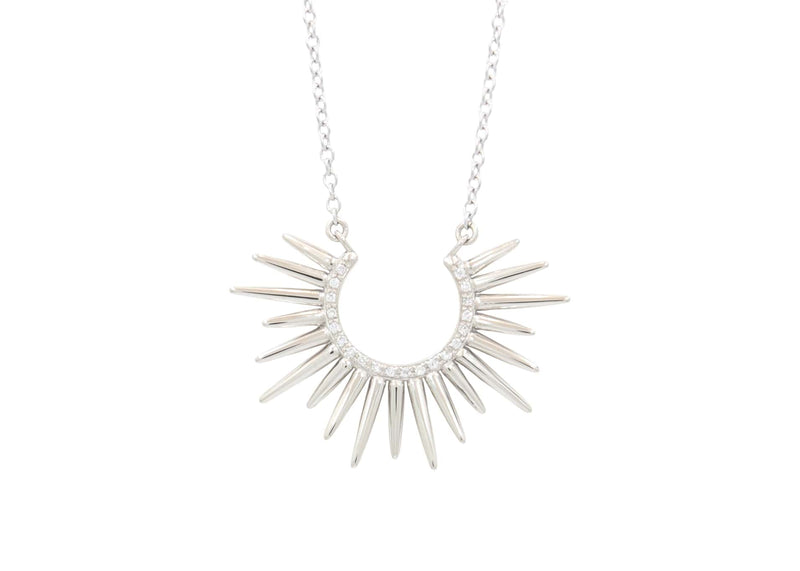 spiky white gold pendant with white diamonds