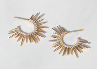 spiky 14k gold urchin earrings with pave set diamonds