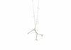 sterling silver seaweed necklace with diamonds and barbell details in chain